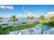 Stunning aerial view of the property, pool, and water access at 178 N Washington Dr, Sarasota, FL 34236