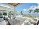 Outdoor patio with fire pit, seating, and water views at 178 N Washington Dr, Sarasota, FL 34236