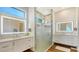 Modern bathroom with frameless shower and double vanity at 178 N Washington Dr, Sarasota, FL 34236
