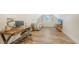 Versatile bonus room features a desk, couch, and TV at 178 N Washington Dr, Sarasota, FL 34236