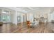 Bright dining area with hardwood floors and large windows at 178 N Washington Dr, Sarasota, FL 34236