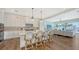 White kitchen with island and stainless steel appliances at 178 N Washington Dr, Sarasota, FL 34236