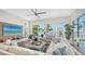 Spacious living room with waterfront views and large windows at 178 N Washington Dr, Sarasota, FL 34236