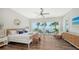Main bedroom with water views and a large dresser at 178 N Washington Dr, Sarasota, FL 34236
