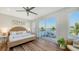 Main bedroom with water views and private deck access at 178 N Washington Dr, Sarasota, FL 34236
