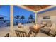 Relaxing patio area with fire pit and waterfront views at 178 N Washington Dr, Sarasota, FL 34236