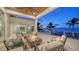 Luxury home with inviting patio, fire pit, and waterfront views at 178 N Washington Dr, Sarasota, FL 34236