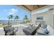 Outdoor patio with fire pit and waterfront views at 178 N Washington Dr, Sarasota, FL 34236
