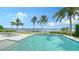 Inviting pool area with water features, lounge chairs, and stunning water views at 178 N Washington Dr, Sarasota, FL 34236