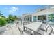 Luxury pool and patio furniture with water views at 178 N Washington Dr, Sarasota, FL 34236