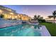 Luxury home with inviting pool, patio, and waterfront sunset views at 178 N Washington Dr, Sarasota, FL 34236