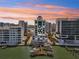 Waterfront condo building boasts private boat docks and stunning sunset views at 258 Golden Gate Pt # 801, Sarasota, FL 34236