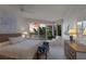Main bedroom with water views, comfortable seating, and large windows at 3080 Grand Bay Blvd # 515, Longboat Key, FL 34228