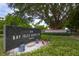 Private community entrance sign for Bay Isles Beach Club at 3080 Grand Bay Blvd # 515, Longboat Key, FL 34228