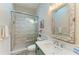Bathroom with a large shower and stylish vanity at 312 Hardin Ave, Anna Maria, FL 34216