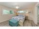 Bright bedroom with a comfortable bed and plenty of natural light at 312 Hardin Ave, Anna Maria, FL 34216