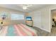 Bedroom with a queen bed and flat-screen TV at 312 Hardin Ave, Anna Maria, FL 34216