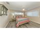 Bedroom with a queen-size bed and access to a full bathroom at 312 Hardin Ave, Anna Maria, FL 34216