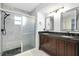 Bathroom with shower, granite countertop, and vanity at 3215 Lake View Blvd, Port Charlotte, FL 33948