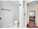Bathroom with toilet and view of bedroom at 3215 Lake View Blvd, Port Charlotte, FL 33948