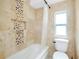Bathroom with beige tile and shower/tub combo at 3215 Lake View Blvd, Port Charlotte, FL 33948