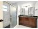 Bathroom with double vanity, granite countertop and shower at 3215 Lake View Blvd, Port Charlotte, FL 33948
