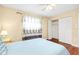 Bedroom with light blue bedding and hardwood floors, and a closet at 3215 Lake View Blvd, Port Charlotte, FL 33948