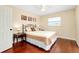 Bedroom with beige bedding and hardwood floors at 3215 Lake View Blvd, Port Charlotte, FL 33948