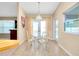 Breakfast nook with glass table and chairs, plus pool view at 3215 Lake View Blvd, Port Charlotte, FL 33948