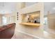 Kitchen features a pass-through to the living room and stainless steel appliances at 3215 Lake View Blvd, Port Charlotte, FL 33948