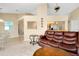 Bright living room with a view into the kitchen and dining area at 3215 Lake View Blvd, Port Charlotte, FL 33948