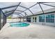 Relaxing screened-in pool and patio area at 3215 Lake View Blvd, Port Charlotte, FL 33948