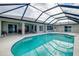 Inviting screened pool with patio furniture at 3215 Lake View Blvd, Port Charlotte, FL 33948