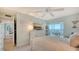 Bright bedroom with water view and built-in dresser at 4800 Gulf Of Mexico Dr # 3, Longboat Key, FL 34228