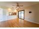 Spacious bedroom with hardwood floors and kitchen pass-through at 4802 Kestral Park Cir # 22, Sarasota, FL 34231