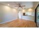 Light and airy bedroom featuring hardwood floors and access to a patio at 4802 Kestral Park Cir # 22, Sarasota, FL 34231
