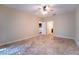 Bedroom with tile floors and ceiling fan, near kitchen at 4802 Kestral Park Cir # 22, Sarasota, FL 34231