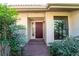 Inviting front door entrance with brick walkway at 4802 Kestral Park Cir # 22, Sarasota, FL 34231