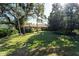 Landscaped yard with lush greenery at 4802 Kestral Park Cir # 22, Sarasota, FL 34231