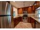 Well-equipped kitchen with stainless steel appliances at 4802 Kestral Park Cir # 22, Sarasota, FL 34231