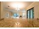 Kitchen with granite countertops and views of living room at 4802 Kestral Park Cir # 22, Sarasota, FL 34231