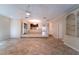 Spacious living room with tile floors and fireplace at 4802 Kestral Park Cir # 22, Sarasota, FL 34231