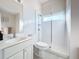 Clean bathroom with walk-in shower and white vanity at 4867 Sabal Lake Cir, Sarasota, FL 34238