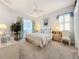 Spacious bedroom with a king-size bed and calming decor at 4867 Sabal Lake Cir, Sarasota, FL 34238