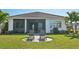 Private backyard with patio and lush lawn at 5060 Lake Overlook Ave, Bradenton, FL 34208