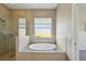 Bathroom with a large shower and garden tub at 5060 Lake Overlook Ave, Bradenton, FL 34208