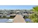 Community boat docks with multiple covered slips at 5060 Lake Overlook Ave, Bradenton, FL 34208