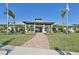 Community clubhouse entrance with landscaping at 5060 Lake Overlook Ave, Bradenton, FL 34208