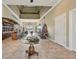 Community room with high ceilings, fireplace and seating at 5060 Lake Overlook Ave, Bradenton, FL 34208