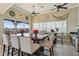 Community room with large table, chairs, and water views at 5060 Lake Overlook Ave, Bradenton, FL 34208
